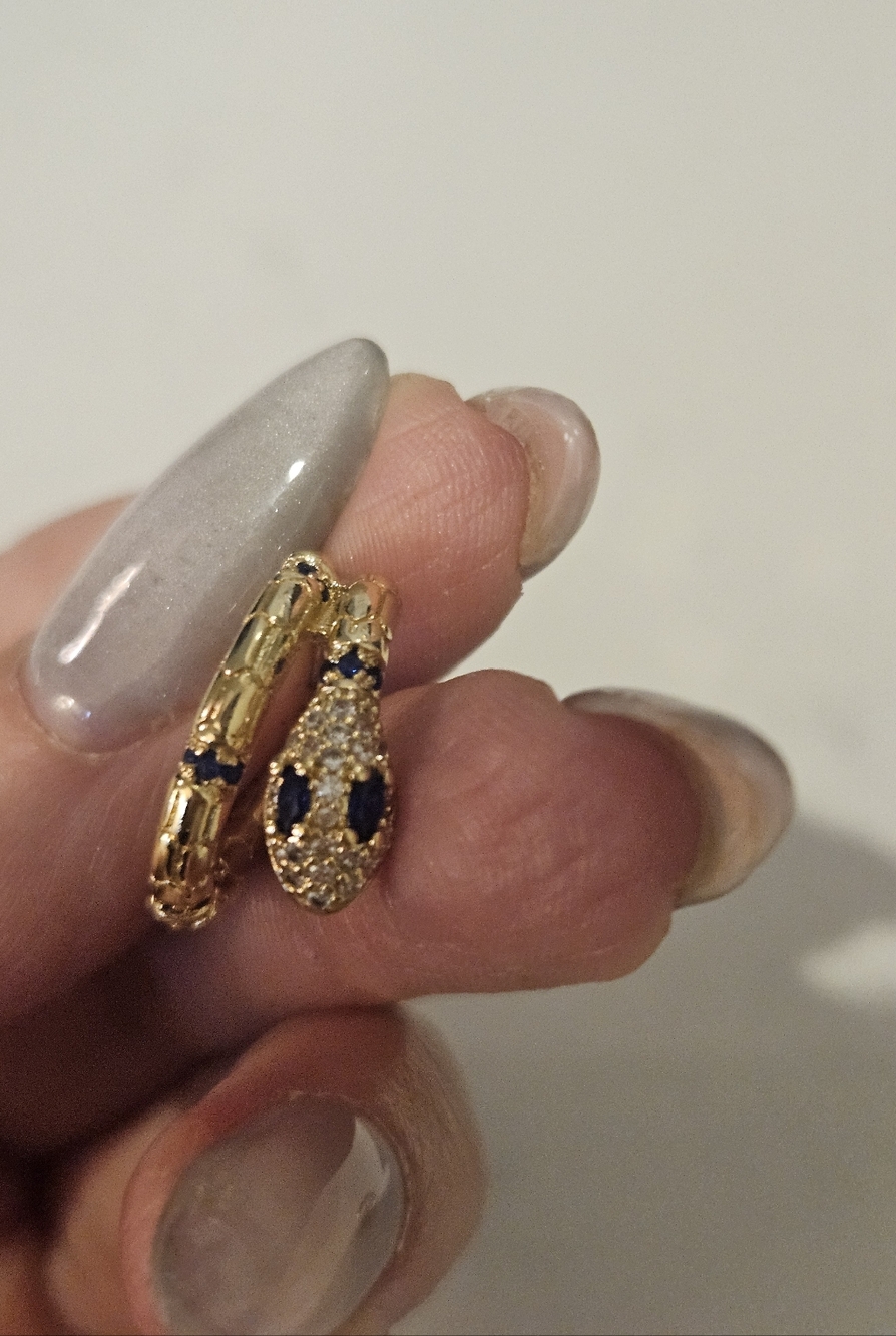 Gold Snake Huggie Earrings with Blue Stone Accents